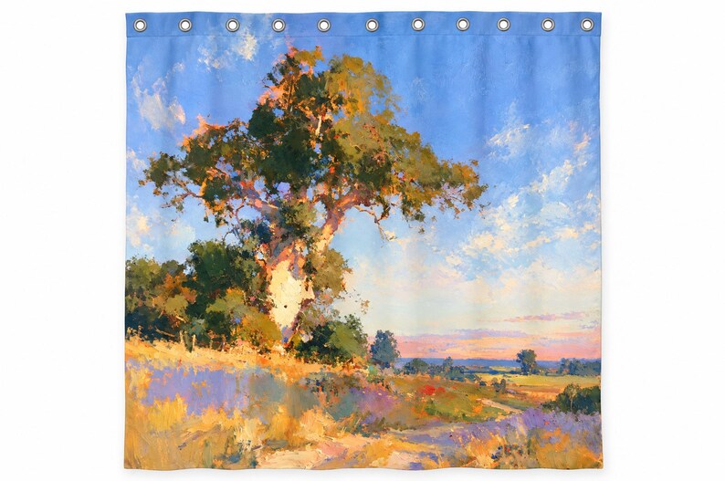 May include: A shower curtain featuring a landscape painting of a large tree standing on a grassy hill under a bright blue sky with scattered white clouds. The scene includes golden yellow fields, green foliage, and a soft pink horizon at sunset.