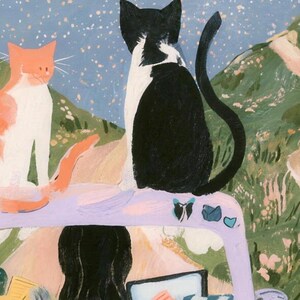 Close-up of the printed design on the shower curtain: the orange cat facing forward beside the black and white cat seen from behind on the lavender car, with the back of the driver's dark hair below them.