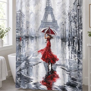 May include: A shower curtain featuring an oil painting style print of a person in a vibrant red dress holding a matching red and white umbrella. The scene depicts a rainy Paris street with the Eiffel Tower in the background, rendered in shades of gray.