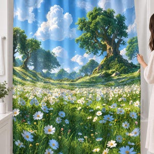 Daisy meadow shower curtain over a bathtub in a white-tiled bathroom: a large old tree on a grassy hill above a field of white daisies under a bright blue sky with clouds; a woman peeks from behind the right edge.