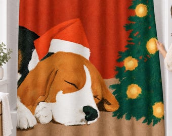 May include: A shower curtain featuring a sleeping beagle wearing a red and white Santa hat, positioned next to a green Christmas tree decorated with yellow lights against a solid red background and a tan floor surface.