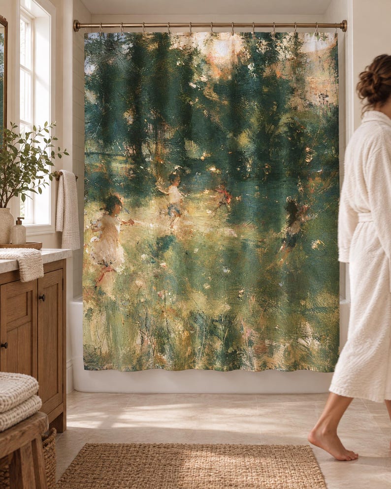 Wider view of a bright bathroom with the impressionist garden shower curtain closed across the tub, a wooden vanity with folded towels to the left and a woman in a white robe walking past barefoot on a woven rug.