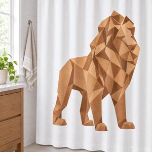 May include: A white shower curtain featuring a large, geometric lion illustration composed of various shades of brown and tan triangular shapes. The lion is depicted in a standing profile view, showcasing a faceted, angular design style.