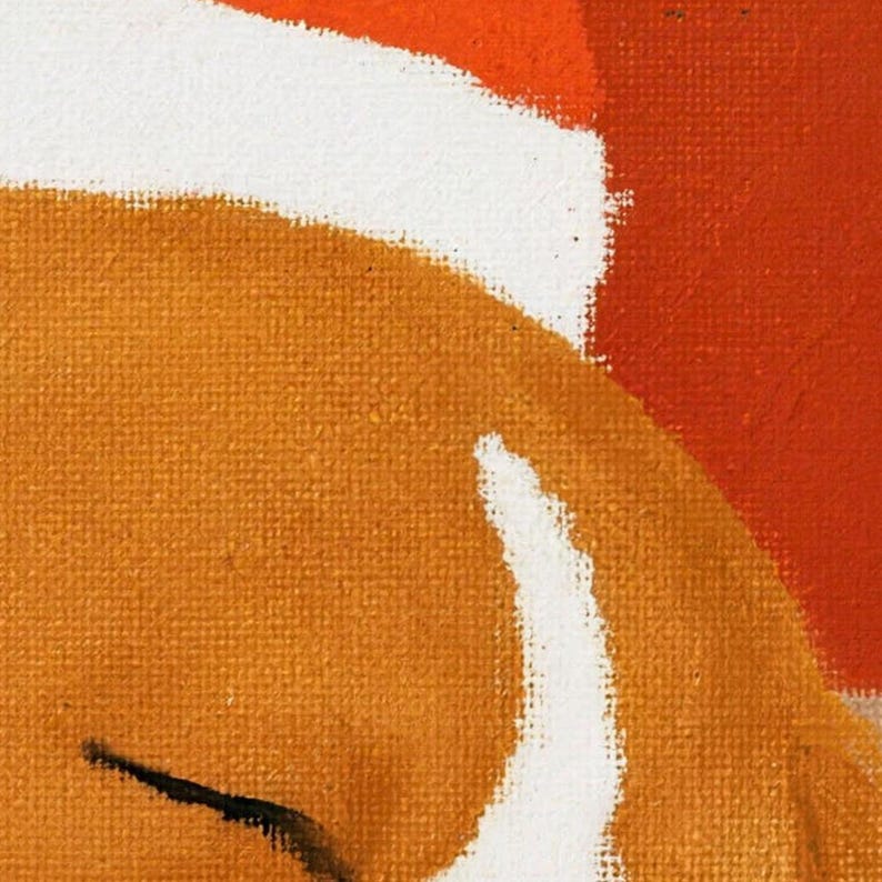 Close-up of the bath mat's painted art: the beagle's closed eye and tan-and-white face under the white trim of a red Santa hat on a red background.
