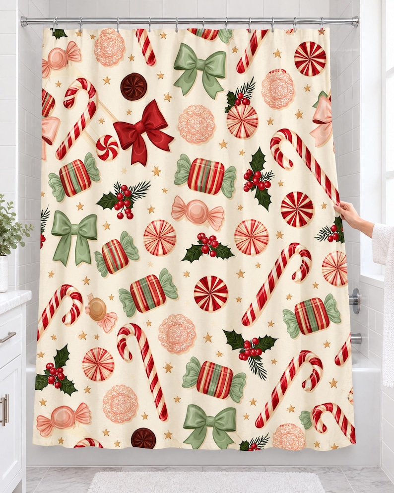 Candy cane Christmas shower curtain with candy canes, peppermint swirls, striped candies, bows and holly on cream, hanging on a chrome rod in a white bathroom.
