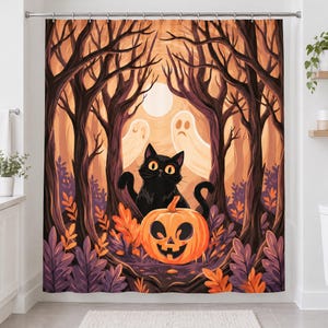 Straight-on view of the whole black cat ghost moon shower curtain hanging flat in a minimal white bathroom, showing the forest scene with two ghosts, a pale full moon and a carved pumpkin.