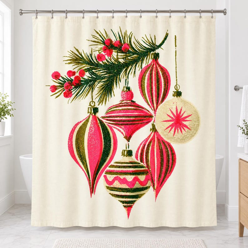 Straight-on view of the whole vintage Christmas ornament shower curtain hanging in a white bathroom, showing the pine sprig, red berries and six striped and starburst baubles on a cream background.