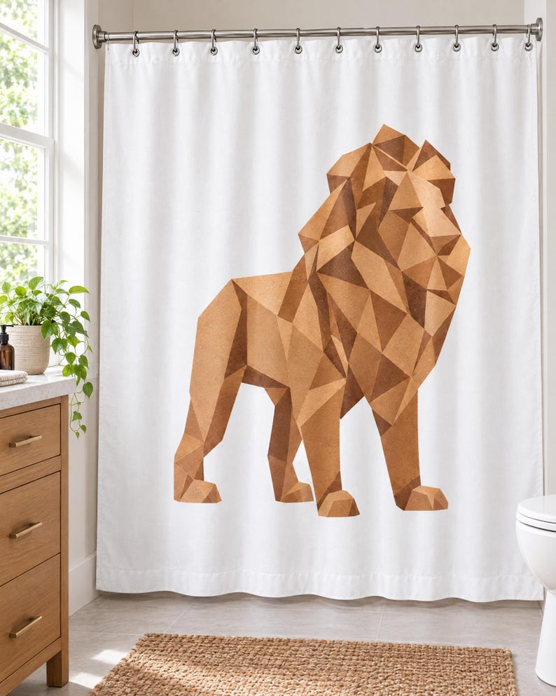 May include: A white shower curtain featuring a large, centred geometric lion illustration composed of various shades of brown and tan triangular shapes. The lion is depicted in a standing profile position with a stylised, angular mane and body.