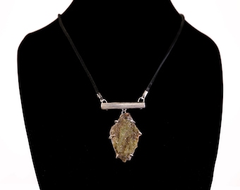 Handmade sterling silver pendant with a natural green drusy uvarovite stone. One-of-a-kind that emphasizes the natural beauty of the stone.