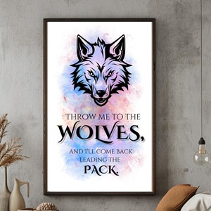 May include: A digital art print featuring a black wolf silhouette with a watercolor background in shades of pink, blue, and purple. The text "THROW ME TO THE WOLVES, AND T'LL COME BACK LEADING THE PACK." is printed below the wolf.