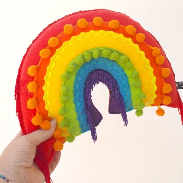 Crazy Happy Claraluna Rainbow Cushion - A Funky Plush Rainbow trimmed with colourful pom poms, tassels and lace. Mini Rainbow Pillow