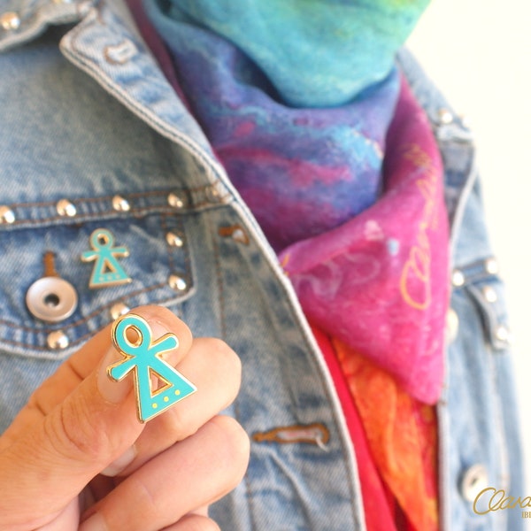 Tanit Goddess Enamel Pin - A Tanit Symbol brooch from Claraluna Ibiza in gold and turquoise. Tanit Ibiza Goddess of Love, Fertility & Dance.