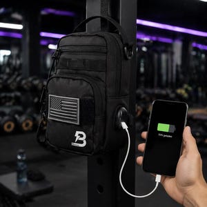 Benson Paris sports bag with USB port. Sporty crossbody bag for power bank & smartphone. Water-repellent with Velcro area for patches.