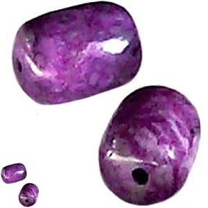 May include: Several polished, purple gemstone beads with a glossy finish. The beads are oval-shaped with a hole drilled through the center, ready for stringing. The color is a deep, rich purple with lighter marbling.