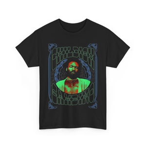 May include: Black t-shirt with a green and red graphic of Childish Gambino in a circle with a blue and green ornate frame.