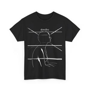 May include: Black t-shirt with a white graphic of a person's head with lines intersecting it. The text "slowdive" is printed above the graphic.