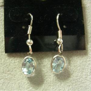 Genuine Blue Topaz Ovals in Sterling Silver Settings on Sterling Silver Earwires