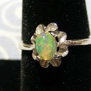 Genuine Ethiopian Opal Oval Cabachon in Sterling Silver Ring Size 7