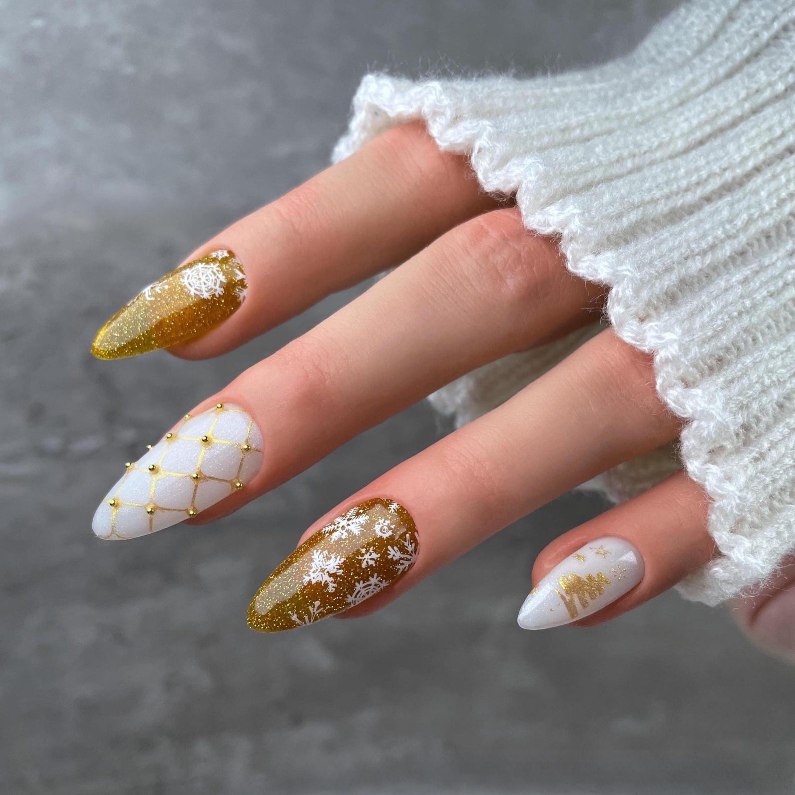 Gold foil and glitter Christmas nails