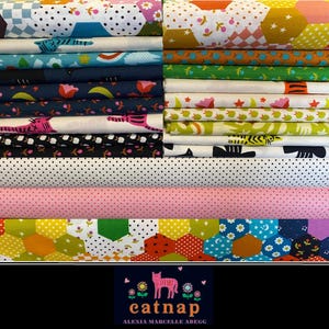 May include: A stack of fabric bolts featuring various patterns, including polka dots, floral designs, and geometric shapes. Colors include pink, blue, green, and black. The image includes the text "catnap" and the designer's name.