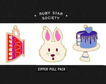 Ruby Star Zipper pulls by Sarah Watts, Unicorn and Thimble pair