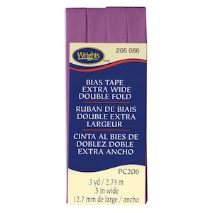 May include: Purple bias tape with the text "Wrights" and "206 066" on the label. The label also says "Bias Tape Extra Wide Double Fold", "Ruban de Biais Double Extra Largeur", and "Cinta al Bies de Doblez Doble Extra Ancho". The label also says "PC206", "3 yd / 2.74 m", ".5 in wide", and "12.7 mm de large / ancho".