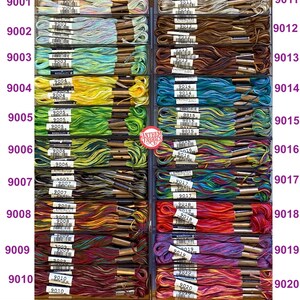 May include: A close-up image of a collection of embroidery floss spools organized in a drawer. The spools are arranged in rows and columns, with each row labeled with a number from 9001 to 9020. The spools are a variety of colors, including blue, green, yellow, orange, red, purple, and brown.