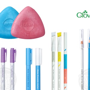 May include: A set of sewing tools including two triangular tailor's chalk, two purple air erasable markers, two blue water erasable markers, a white marking pen, and three white fabric marking pencils with yellow, blue, and white markings.