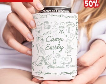 May include: White can cooler with a green and white camping themed design. The cooler features a variety of camping icons, including a tent, a campfire, a grill, and a camper van. The text "Camp Emily" is written in a green font. The text "Asheville, NC 2025" is written in a smaller green font.