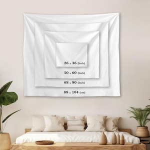 May include: White tapestries of varying sizes are displayed, with dimensions labeled in inches and centimeters. The sizes include 26 x 36 inches, 50 x 60 inches, 68 x 80 inches, and 88 x 104 cm. The tapestries are hung on a wall above a bed.