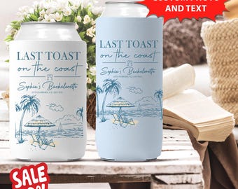 May include: Two white can coolers with blue and black illustrations of palm trees, an umbrella, and beach chairs. The text on the coolers reads "Last Toast on the Coast" and "Sophia's Bachelorette".