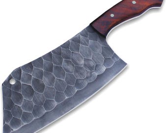 May include: A large, textured cleaver knife with a dark, patterned blade and a wooden handle. The handle is a rich, dark brown with visible wood grain and is secured with small silver rivets. The blade has a unique honeycomb pattern.