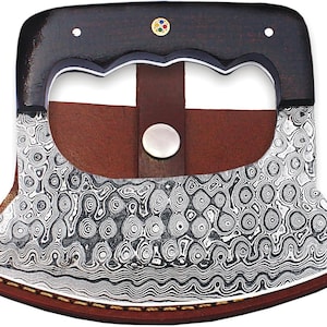 May include: A black handled cleaver with a decorative, wavy, damascus steel blade. The cleaver is in a brown leather sheath.