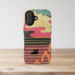 May include: A phone case featuring a Japanese-inspired design with a black cat peeking out from behind a striped barrier. The case has a colorful background with red, yellow, and green accents. The case is designed to fit a smartphone.