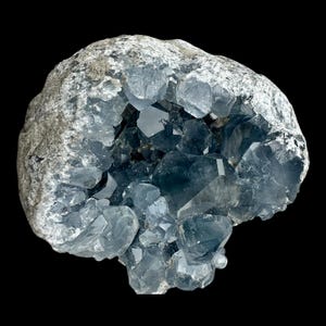 Celestite geode with blue crystals natural celestite cluster from madagascar for home décor and crystal collectors