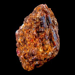 Painite crystal with ruby inclusions, uv fluorescent mineral specimen, rare mineral collector piece, natural uncut painite from myanmar