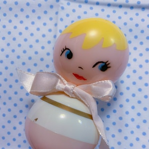 VTG Kitsch Celluloid Bakelight Pink N White Doll Rattle Crib Toy w Bow