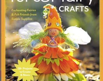 May include: A book cover with the title "forest fairy crafts" and a picture of a felt fairy doll with a flower petal skirt. The book cover is orange and features the text "Enchanting Fairies & Felt Friends from Simple Supplies" and "28+ Projects to Create & Share".