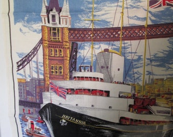 May include: A vintage textile featuring a detailed illustration of the Royal Yacht Britannia sailing on the water, with the Tower Bridge in the background. The image includes flags and small boats, with a blue and white sky.