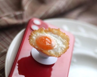 Smartphone Grip in attesa di un mese: il piccolo uovo fritto di Fairy