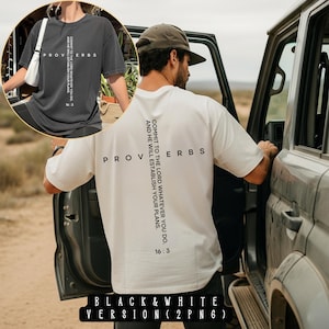 May include: Black and white t-shirts with the word "PROVERBS" printed on the front and back. The back of the white shirt has the text "COMMIT TO THE LORD WHATEVER YOU DO, AND HE WILL ESTABLISH YOUR PLANS. 16:3."
