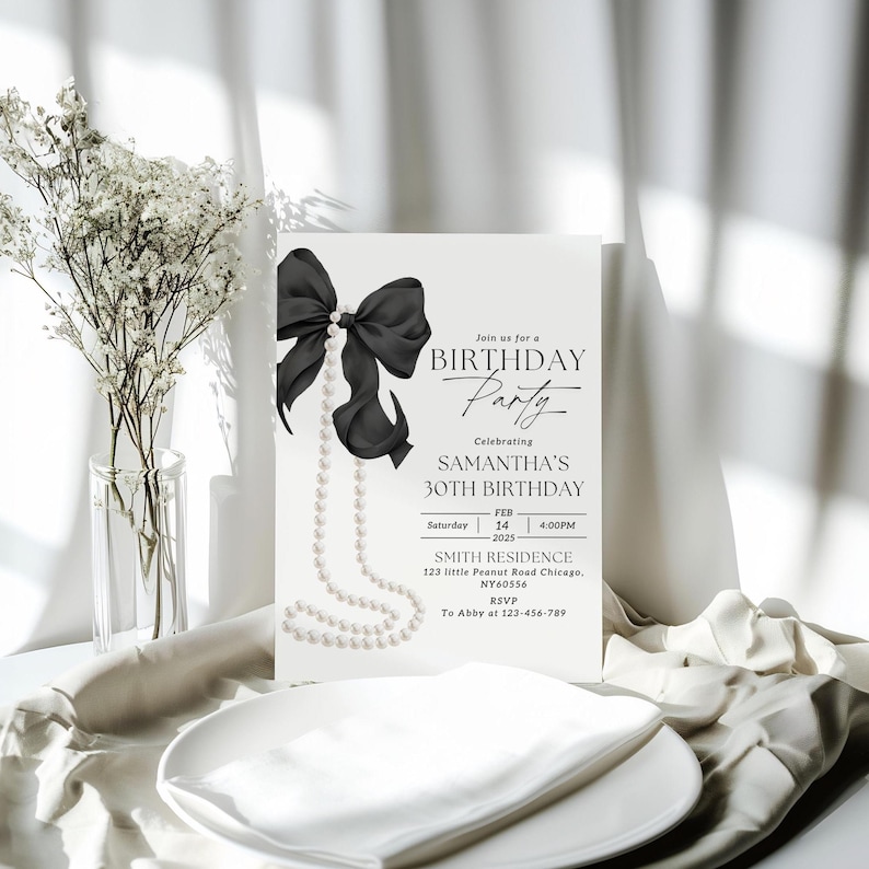 May include: A black and white birthday party invitation featuring a black bow and pearl necklace. The invitation reads "Join us for a Birthday Party Celebrating Samantha's 30th Birthday" with the date and time of the party. The location is listed as "Smith Residence 123 little Peanut Road Chicago, NY60556".