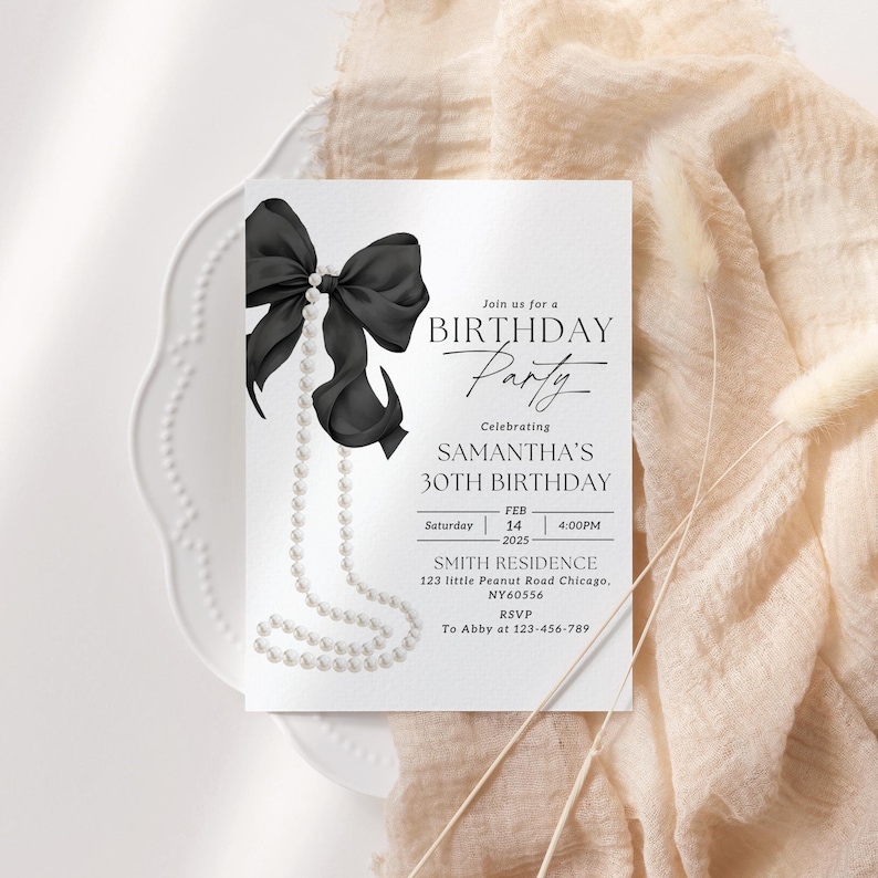 May include: A black and white birthday party invitation with a black bow and pearl necklace. The invitation reads "Join us for a Birthday Party Celebrating Samantha's 30th Birthday. Saturday, 14 February 2025, 4:00 PM. Smith Residence, 123 Little Peanut Road Chicago, NY60556. RSVP to Abby at 123-456-789."