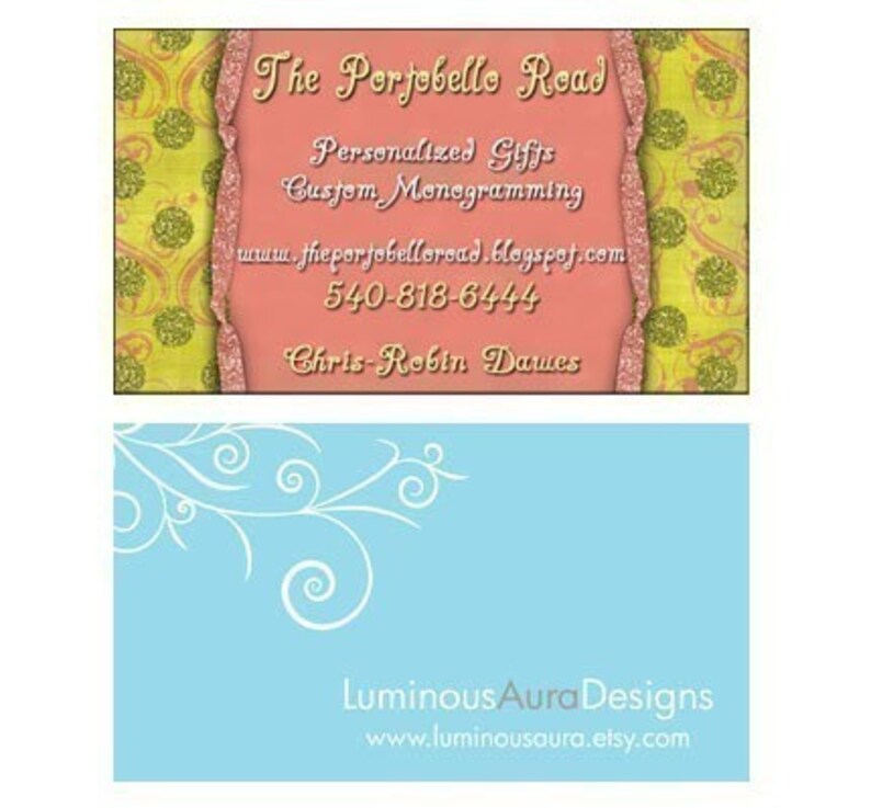 May include: A pink business card with gold glitter accents. The text on the card reads "The Portobello Read", "Personalized Gifts", "Custom Monogramming", "www.theportobelloread.blogspot.com", "540-818-6444", and "Chris-Robin Dawes". A blue business card with white swirls in the top left corner. The text on the card reads "Luminous Aura Designs" and "www.luminousaura.etsy.com".