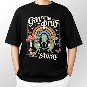 Frog Pride Shirt, Gay The Pray Away Frogs Rainbow Retro Graphic Black T-Shirt, Funny Queer Expression Shirt, Shirt For LGBTQ Adults