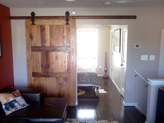 Sliding Barn Door From Reclaimed Wood And Vintage Hardware