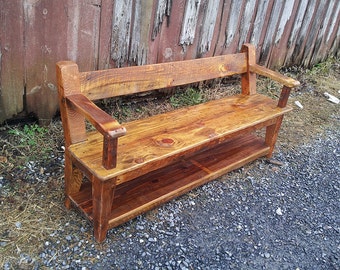 Wood dining bench with back and armrests. Reclaimed wood bench