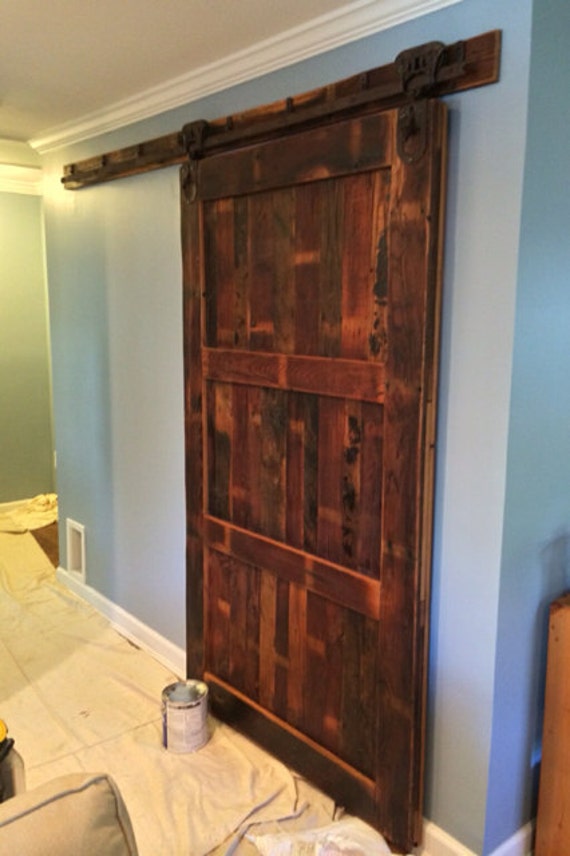 Sliding Barn Door From Reclaimed Wood And Vintage Hardware