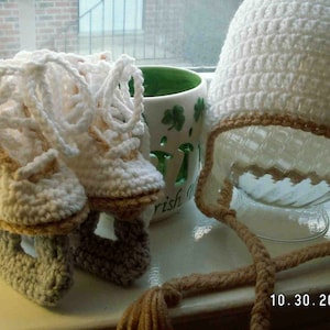 Figure Skate booties and an earflap hat available in three sizes