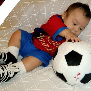 Crocheted soccer cleats for babies in four sizes